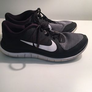 Black Nike running shoes